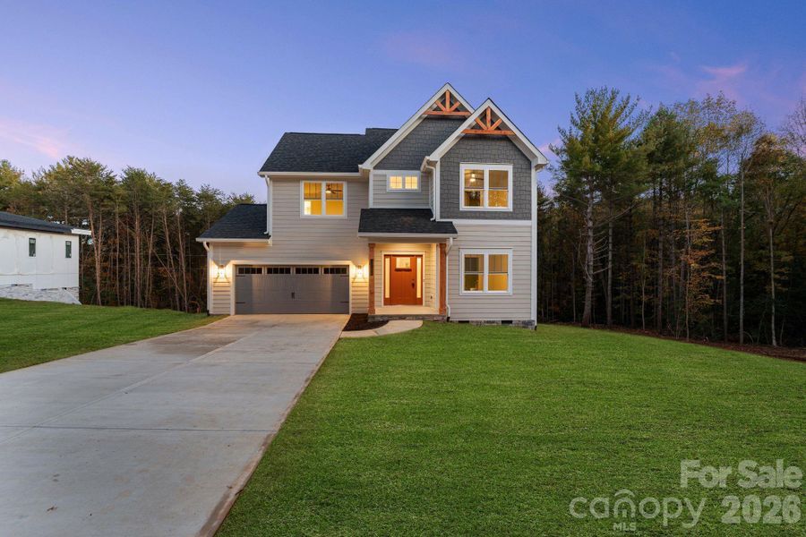 Front exterior of a new home in , Hickory, NC, highlighting curb appeal (Image 25).