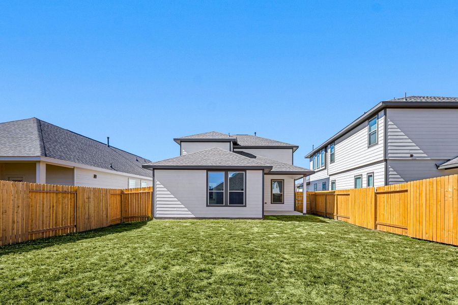 This backyard is enjoyable for everyone! From pets playing, kids jumping on the trampoline, or even having a garden, this amazing backyard provides space for endless activities for the whole family! This backyard is enjoyable for everyone! From pets playing, kids jumping on the trampoline, or even having a garden, this amazing backyard provides space for endless activities for the whole family!