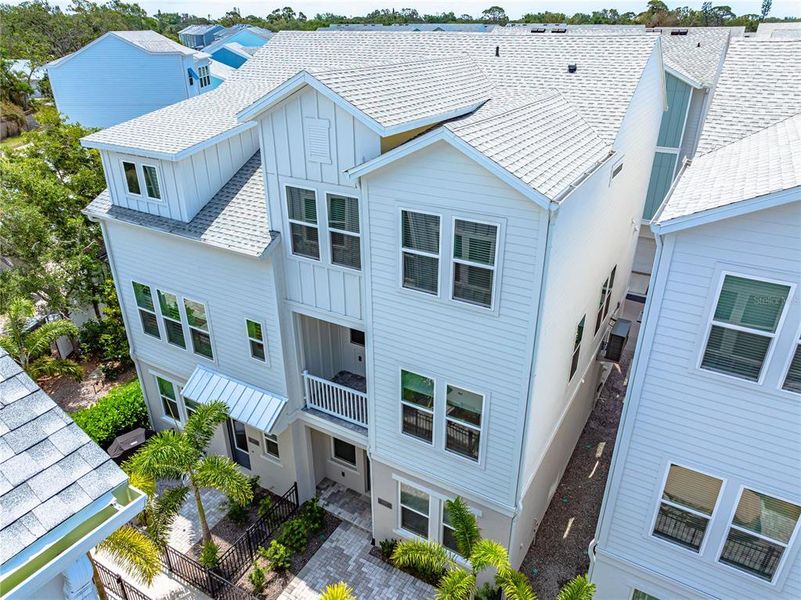 Front exterior of a new home in , Sarasota, FL, highlighting curb appeal (Image 21).