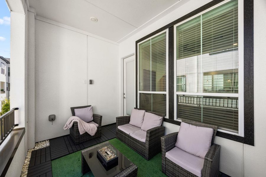 Exterior details and patio area of a home in The Corner At Buffalo Pointe, Houston (Image 25).
