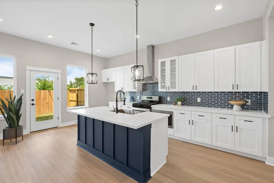 Model home photos for finishes only. Floorplan may vary