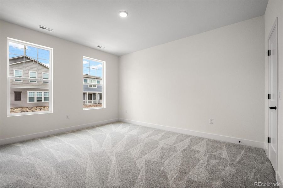 Spacious, unfurnished interior of a new home in Trailside at Cottonwood Creek, Colorado Springs (Image 28).