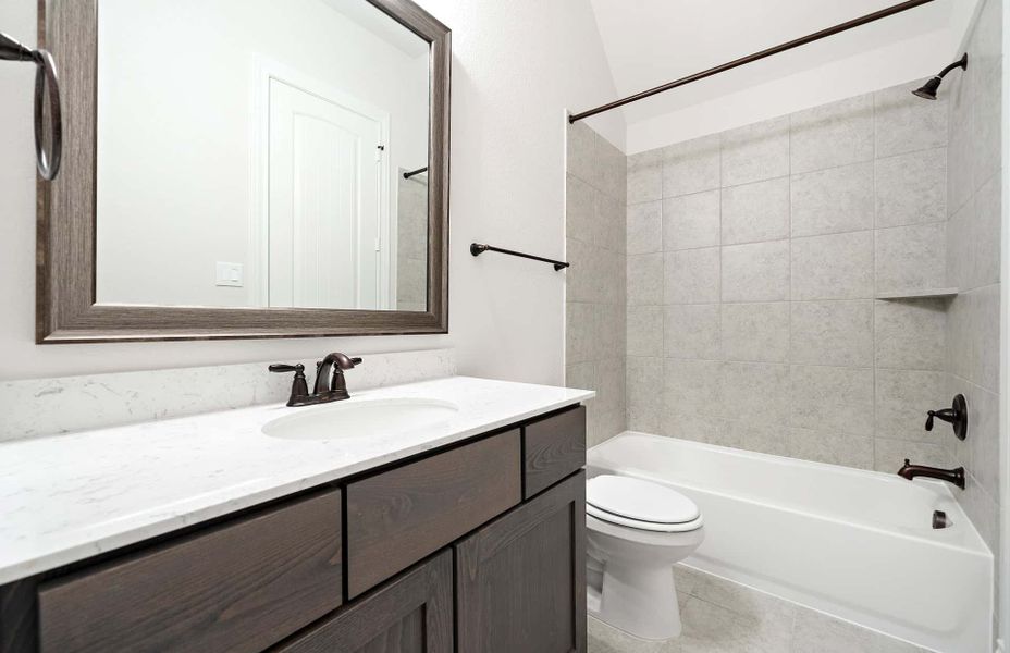 Representative furnished interior of a home built from the 2500 by Ravenna Homes in The Highlands 55′, Porter (Image 13). Representative furnished interior of a home built from the 2500 by Ravenna Homes in The Highlands 55′, Porter (Image 13).