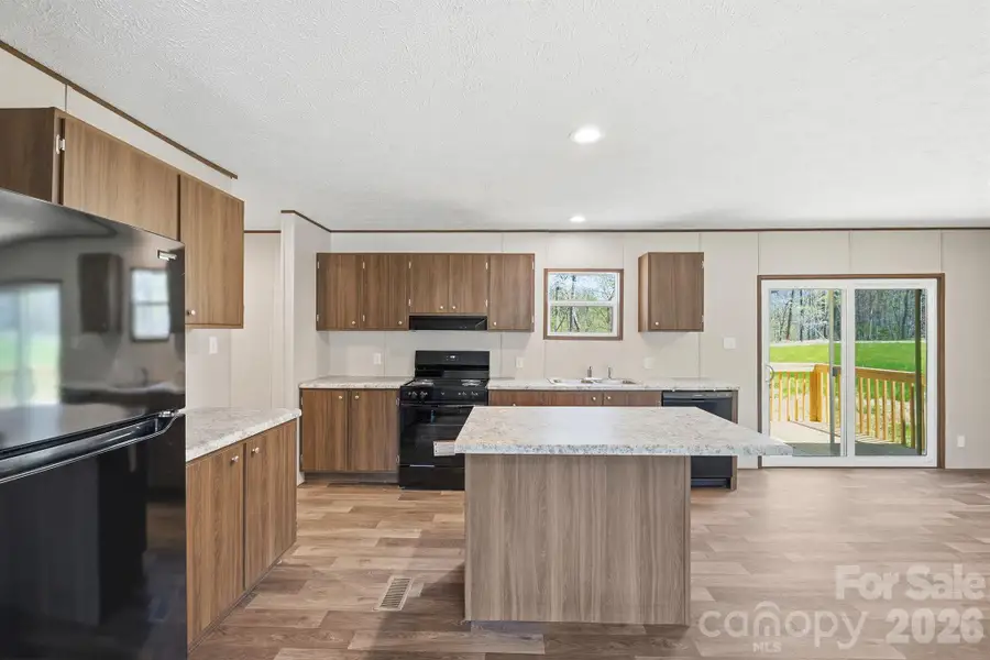 Furnished interior view inside a new home in , Old Fort (Image 6).