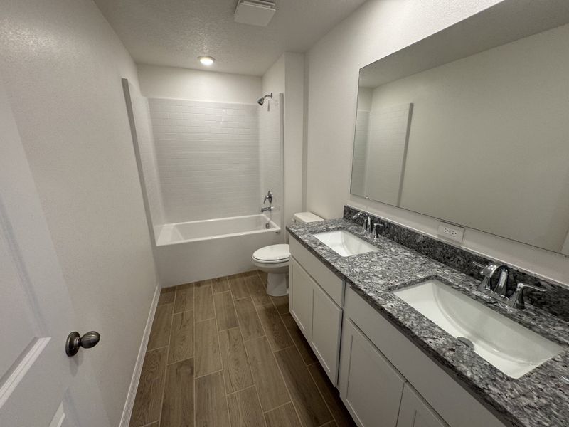 Furnished interior view inside a new home in Lake Deer Estates, Poinciana (Image 6).