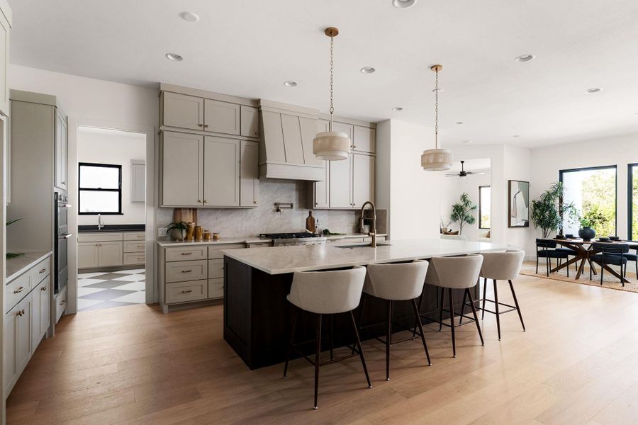 Culinary excellence awaits in this modern kitchen, seamlessly flowing into a dining area with ample natural light.