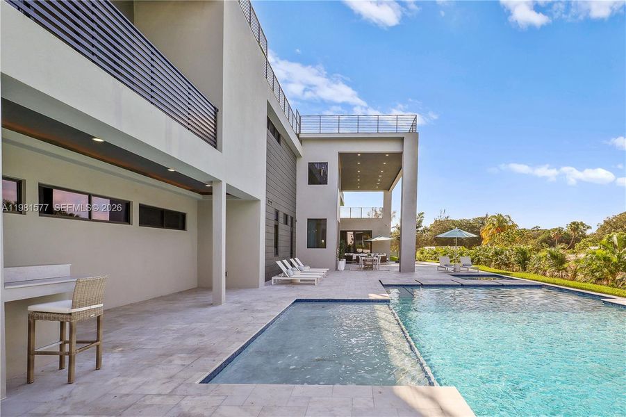 Exterior details and patio area of a home in , Davie (Image 33).