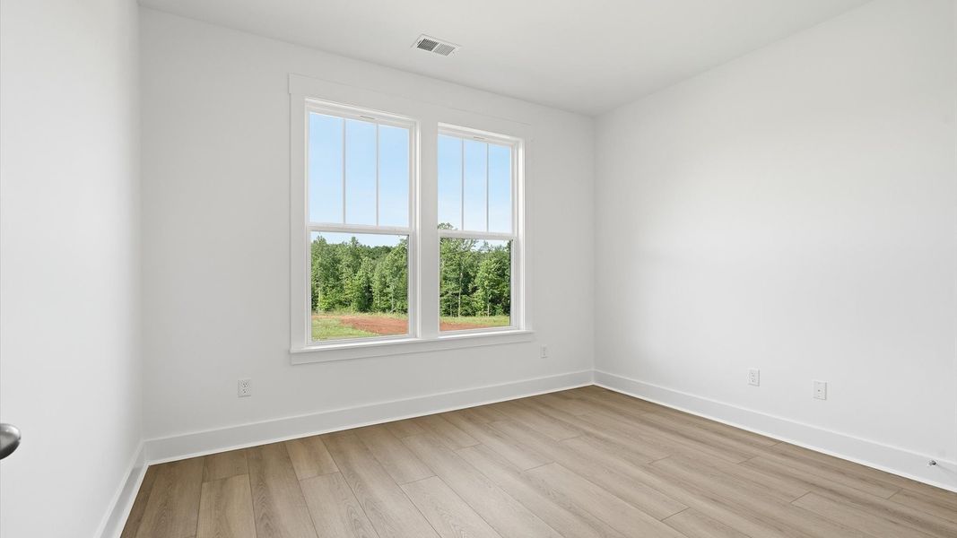 Modern flex room offering extra space for work, entertainment, or relaxation located in the growing Woodruff, SC