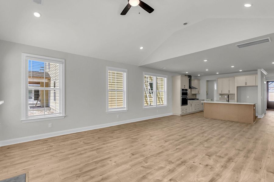Spacious, unfurnished interior of a new home in Tidewater at Lakes of Cane Bay, Summerville (Image 21).