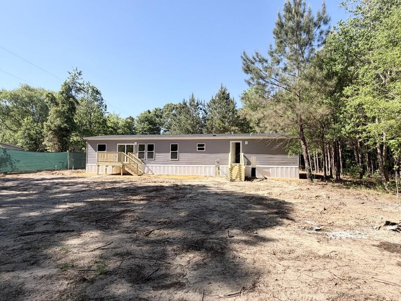 Exterior details and patio area of a home in , Round O (Image 8).