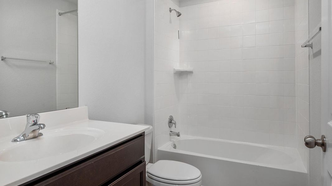 Full bathroom with vanity and shower / tub combination