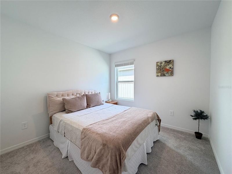 Furnished interior view inside a new home in Westview Community Group Page, Kissimmee (Image 14).