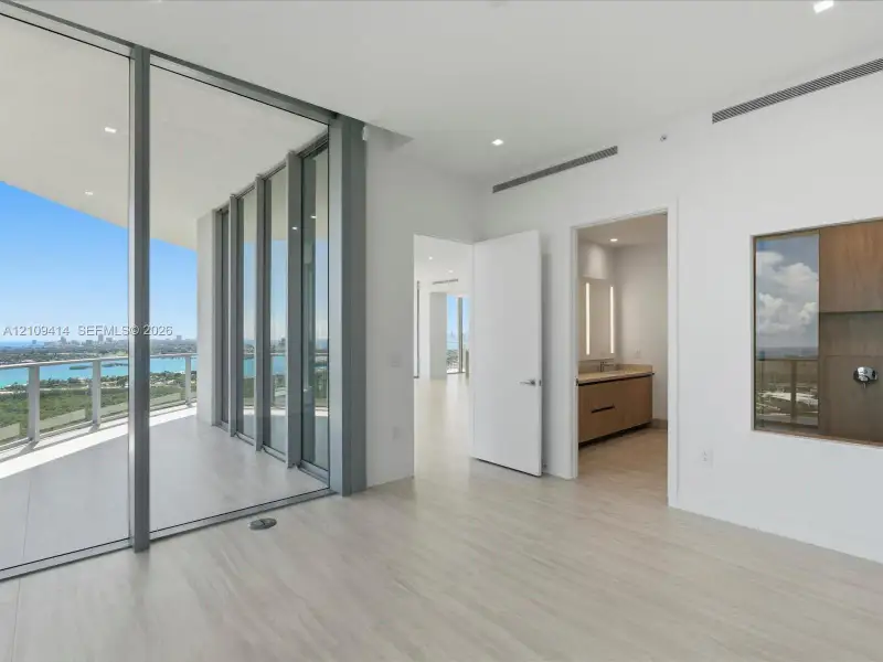 Spacious, unfurnished interior of a new home in , North Miami (Image 38).