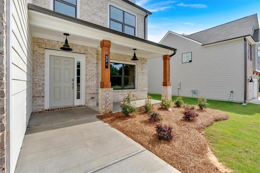 Exterior details and patio area of a home in The Overlook at Factory Shoals, Mableton (Image 20).