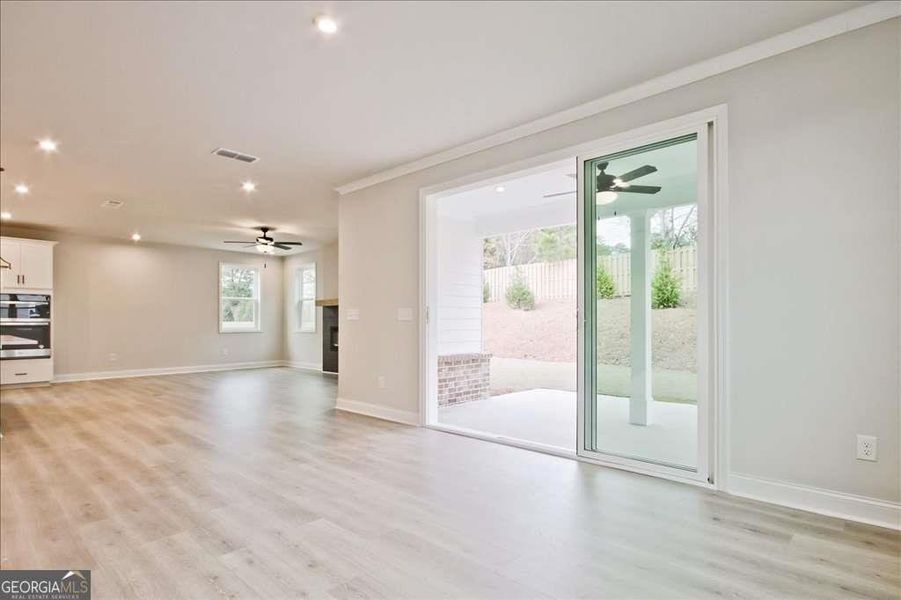 Spacious, unfurnished interior of a new home in The Paddocks at Doc Hughes, Buford (Image 22).