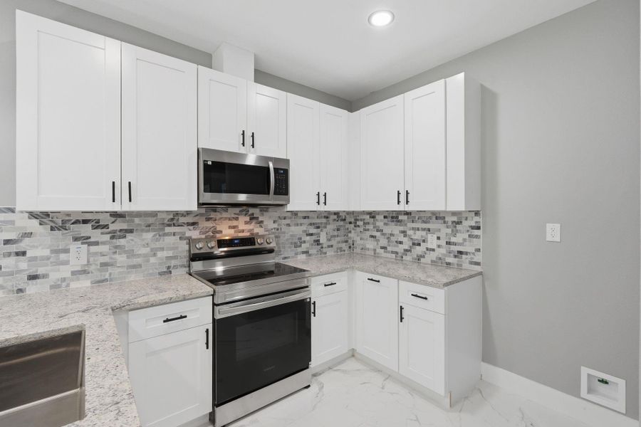 Furnished interior view inside a new home in , Willis (Image 9).