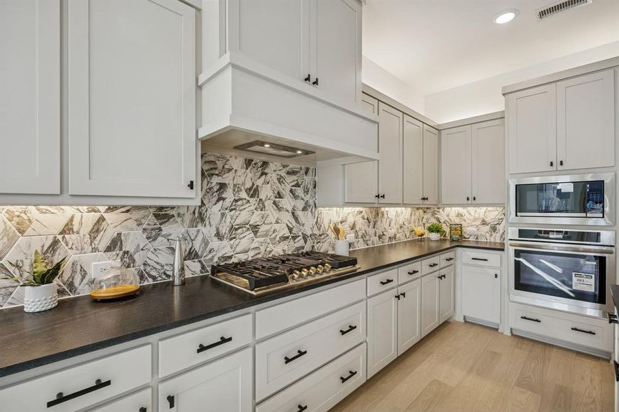 With fantastic space, ample storage and contemporary appliances, this kitchen is all that you've dreamed of and more!