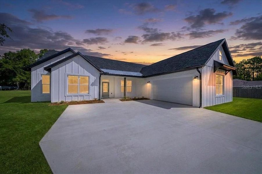 Front exterior of a new home in , Ocala, FL, highlighting curb appeal (Image 26). Front exterior of a new home in , Ocala, FL, highlighting curb appeal (Image 26).