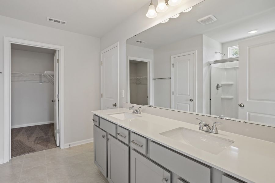 Furnished interior view inside a new home in Cambridge Reserve, Angier (Image 14). Furnished interior view inside a new home in Cambridge Reserve, Angier (Image 14).