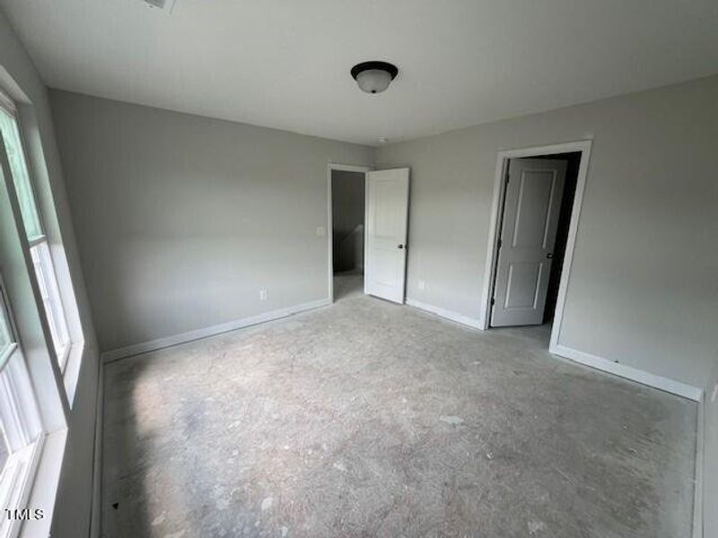 Spacious, unfurnished interior of a new home in Wellers Knoll, Lillington (Image 54).