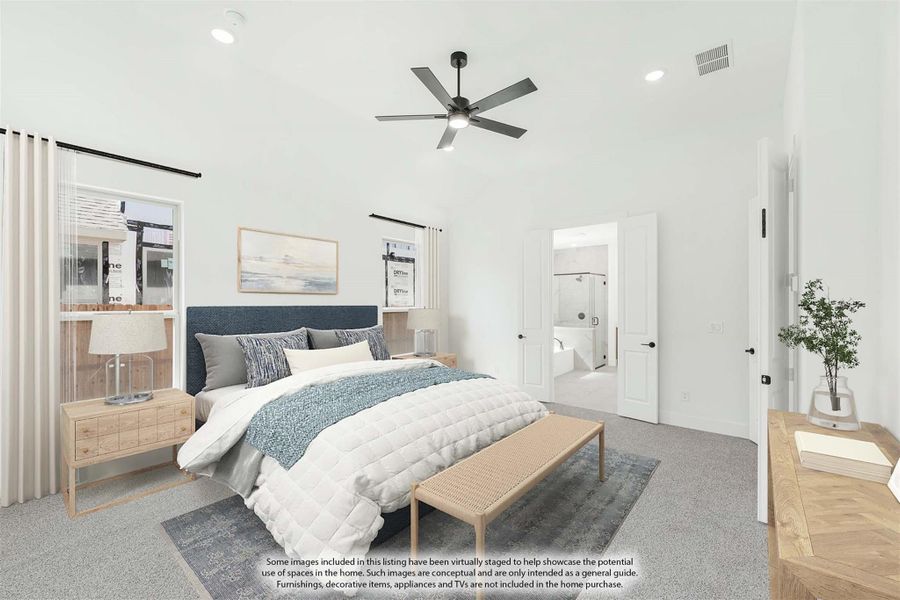 Bright master bedroom with high ceilings, ceiling fan, carpet floors, and ensuite bathroom doorway visible Bright master bedroom with high ceilings, ceiling fan, carpet floors, and ensuite bathroom doorway visible