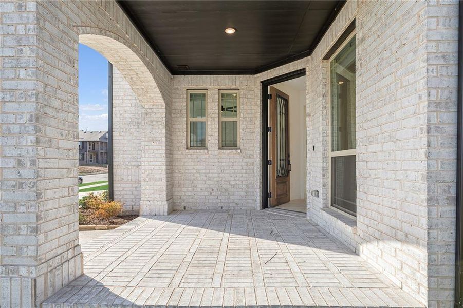 Exterior details and patio area of a home in West Crossing, Anna (Image 3). Exterior details and patio area of a home in West Crossing, Anna (Image 3).