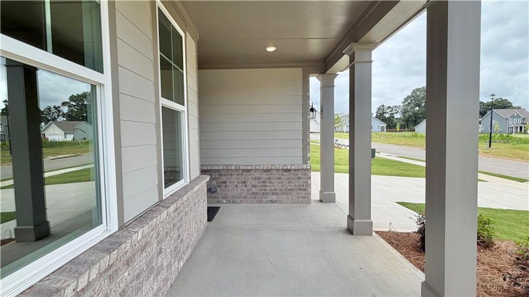 Exterior details and patio area of a home in Wehunt Meadows, Hoschton (Image 3).