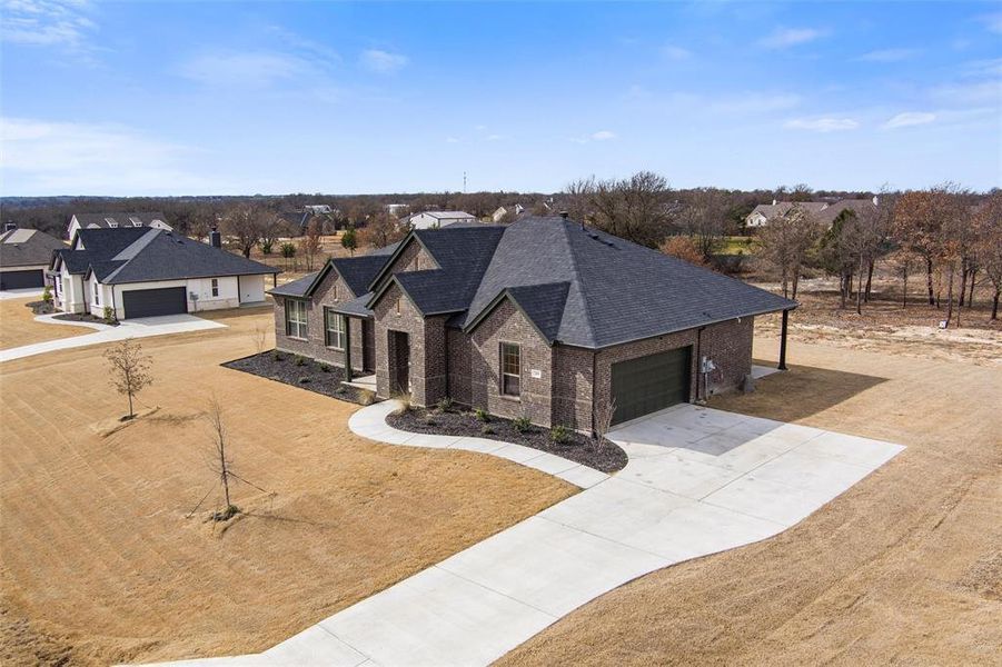 Front exterior of a new home in , Boyd, TX, highlighting curb appeal (Image 21).
