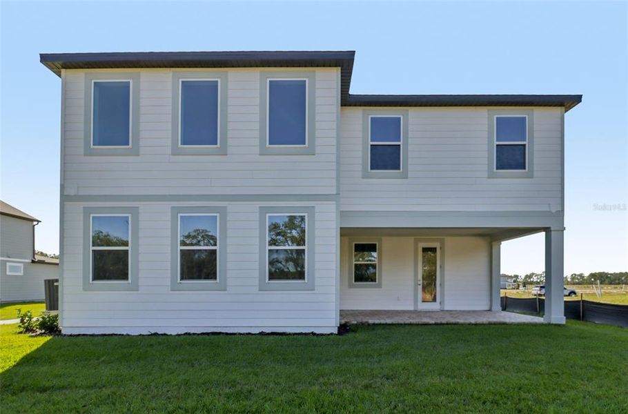Exterior details and patio area of a home in Northlake Traditional, Winter Garden (Image 27).