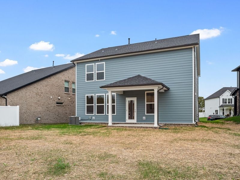 Exterior details and patio area of a home in Woods Crossing, Gallatin (Image 28).