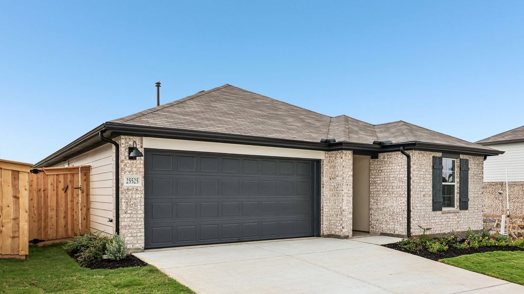 Front exterior of a new home in Briarwood, Elgin, TX, highlighting curb appeal (Image 18).