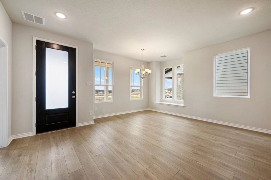 Spacious, unfurnished interior of a new home in The Cottages at Lariat, Liberty Hill (Image 24).