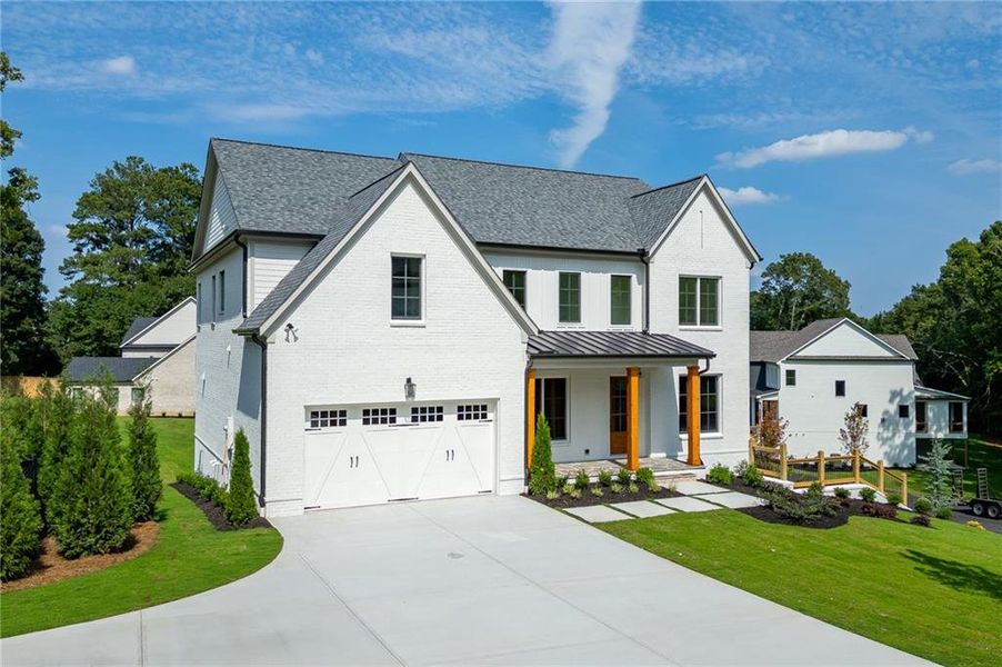 Front exterior of a new home in , Buford, GA, highlighting curb appeal (Image 32).