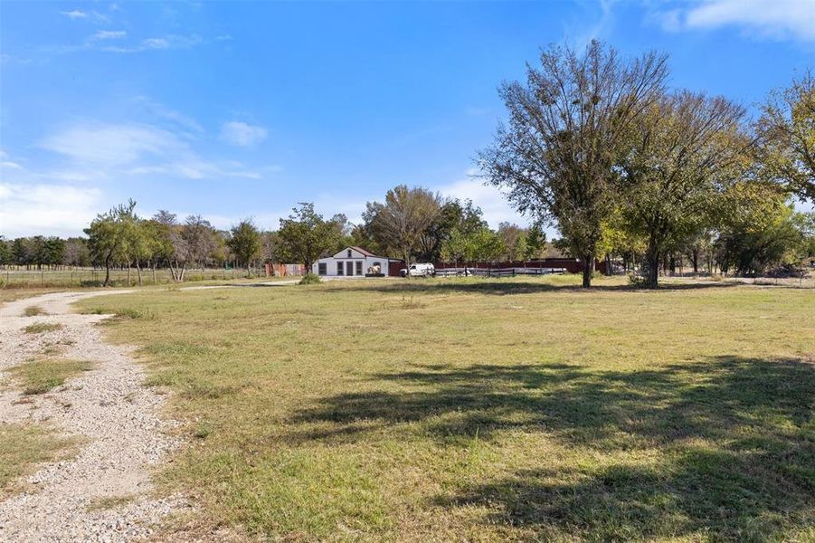 Surrounding community with a yard and a view of countryside Surrounding community with a yard and a view of countryside