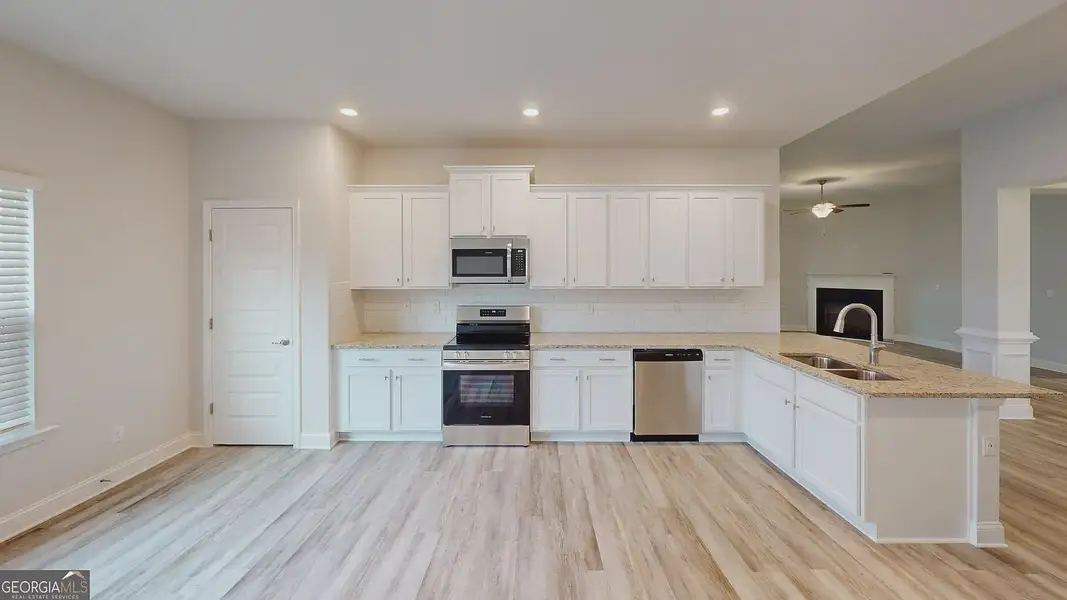 Furnished interior view inside a new home in Holliday Pass, Griffin (Image 5).