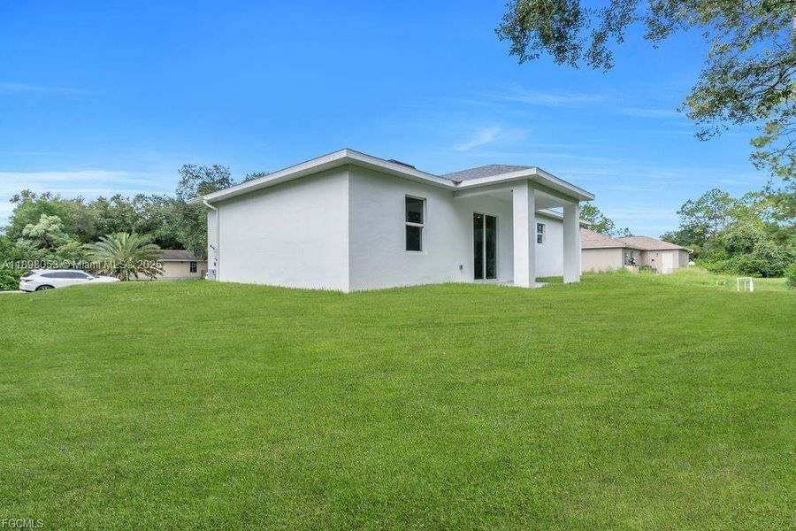 Exterior details and patio area of a home in , Lehigh Acres (Image 2).