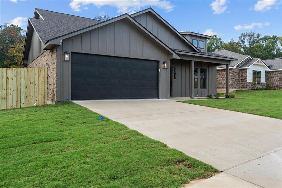 Front exterior of a new home in , Lindale, TX, highlighting curb appeal (Image 16). Front exterior of a new home in , Lindale, TX, highlighting curb appeal (Image 16).
