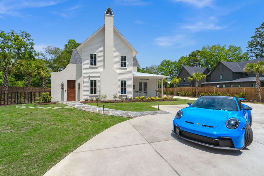 Front exterior of a new home in , Johns Island, SC, highlighting curb appeal (Image 26).