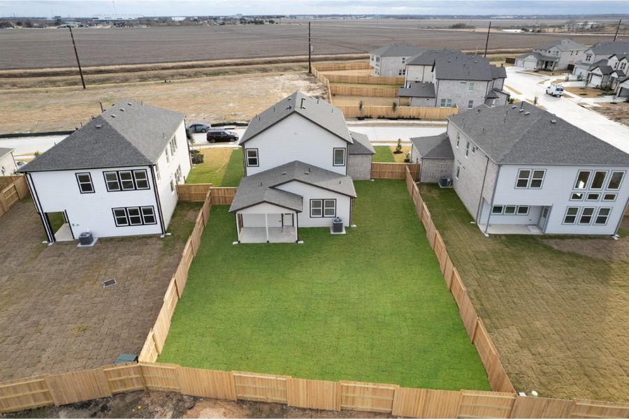Exterior details and patio area of a home in Creekhaven, Iowa Colony (Image 23). Exterior details and patio area of a home in Creekhaven, Iowa Colony (Image 23).