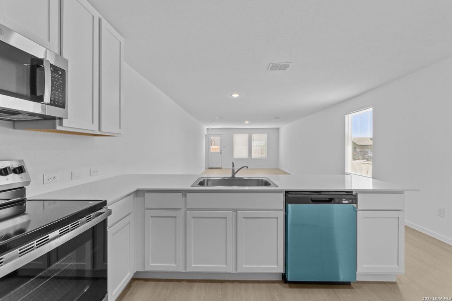 Furnished interior view inside a new home in Higdon Crossing, San Antonio (Image 6).