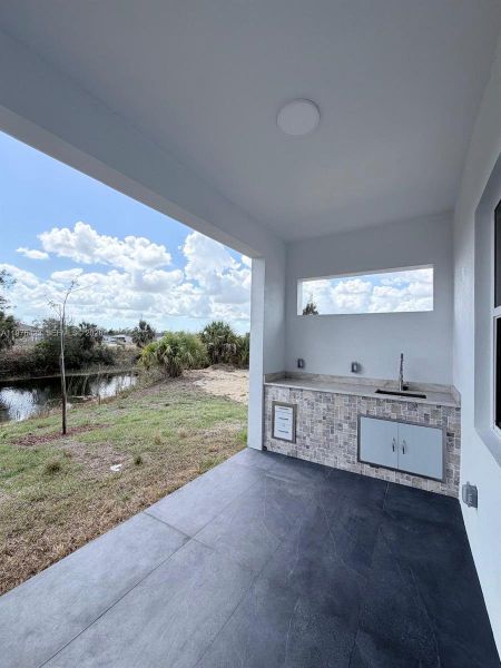 Exterior details and patio area of a home in , Cape Coral (Image 28).