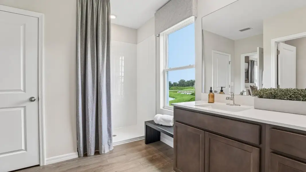 Furnished interior view inside a new home in Farm at Varrea, Plant City (Image 32).
