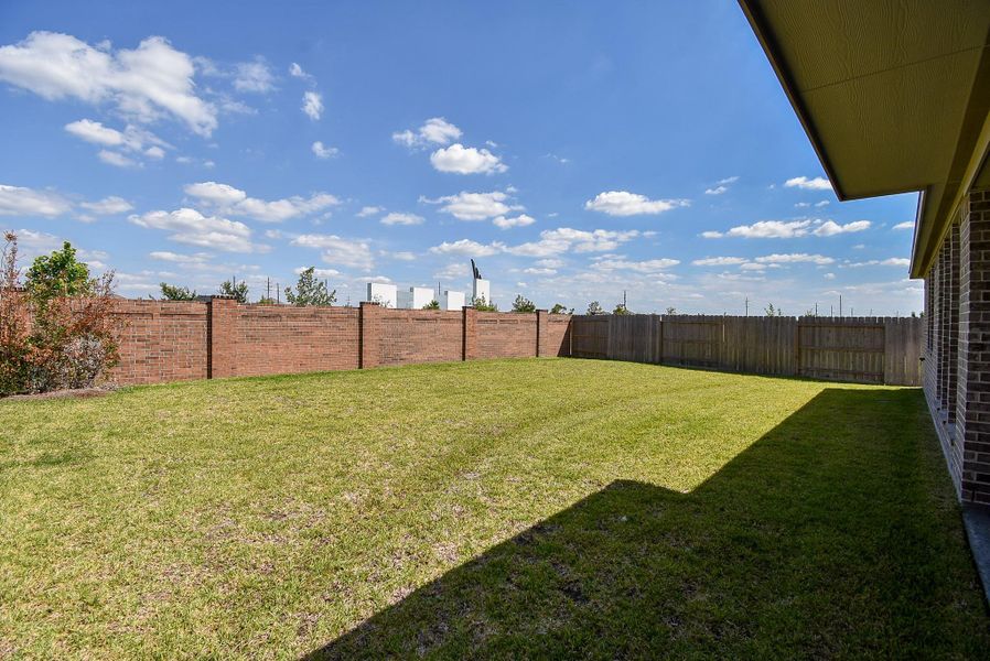 Exterior details and patio area of a home in Marvida, Cypress (Image 27).