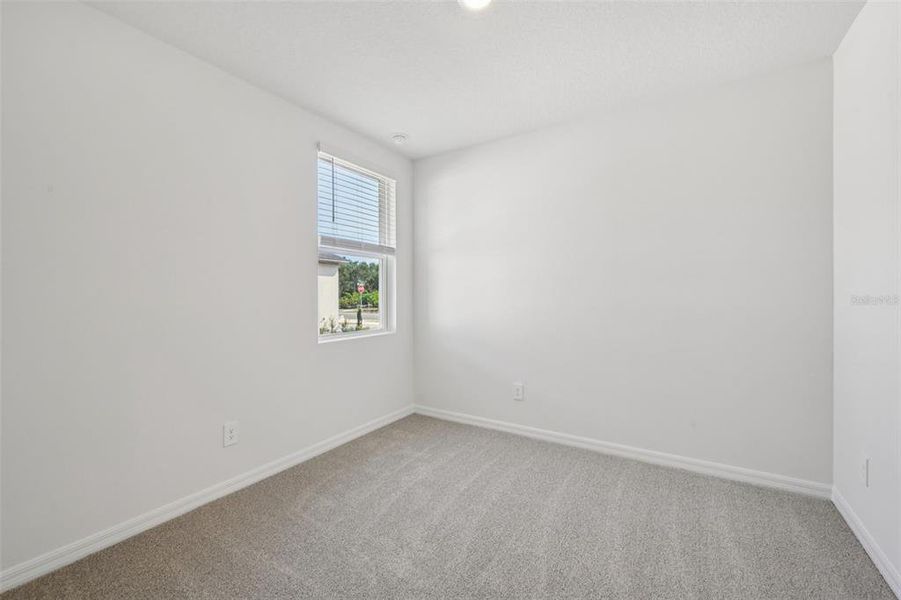 Spacious, unfurnished interior of a new home in Ridgehaven - Villas, Ormond Beach (Image 22).