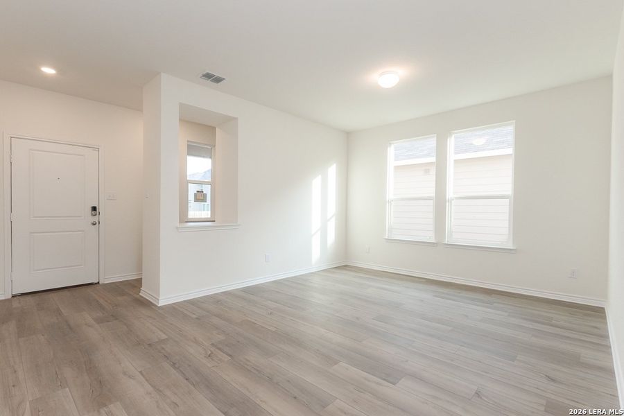 Spacious, unfurnished interior of a new home in Preserve at Culebra - Classic Collection, San Antonio (Image 8).