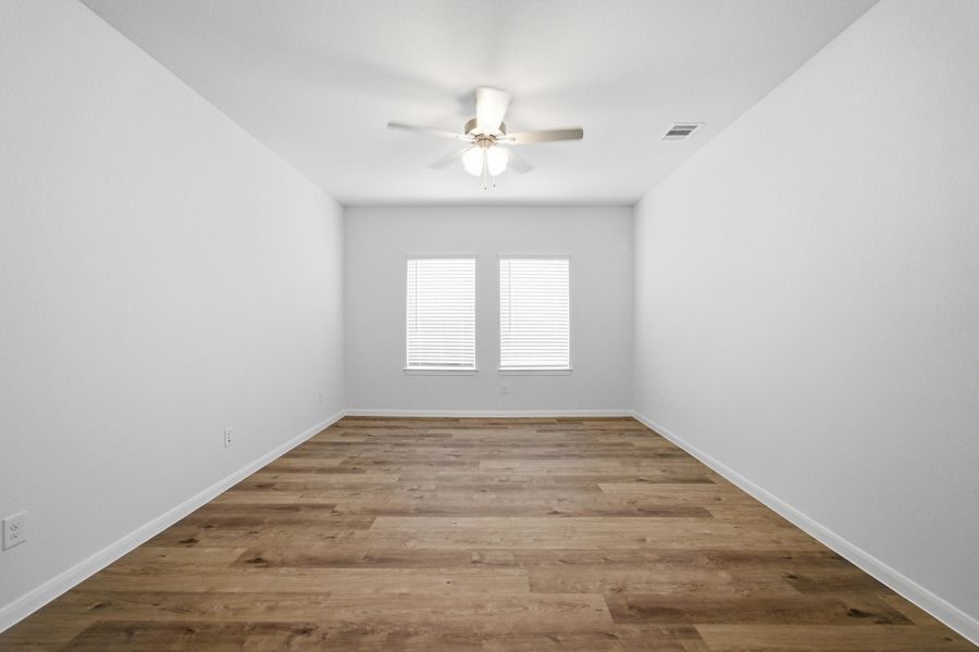 Spacious, unfurnished interior of a new home in Windrose Green, Angleton (Image 24).