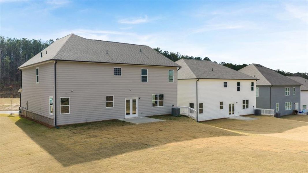 Exterior details and patio area of a home in Hamptons at Riverwood South, Dallas (Image 25).