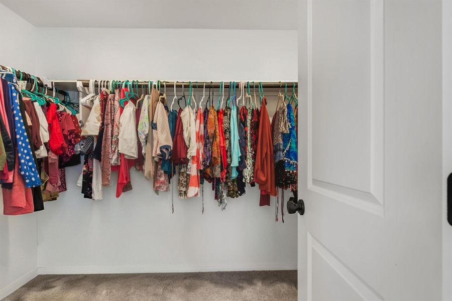 Primary Bedroom walk in closet Primary Bedroom walk in closet