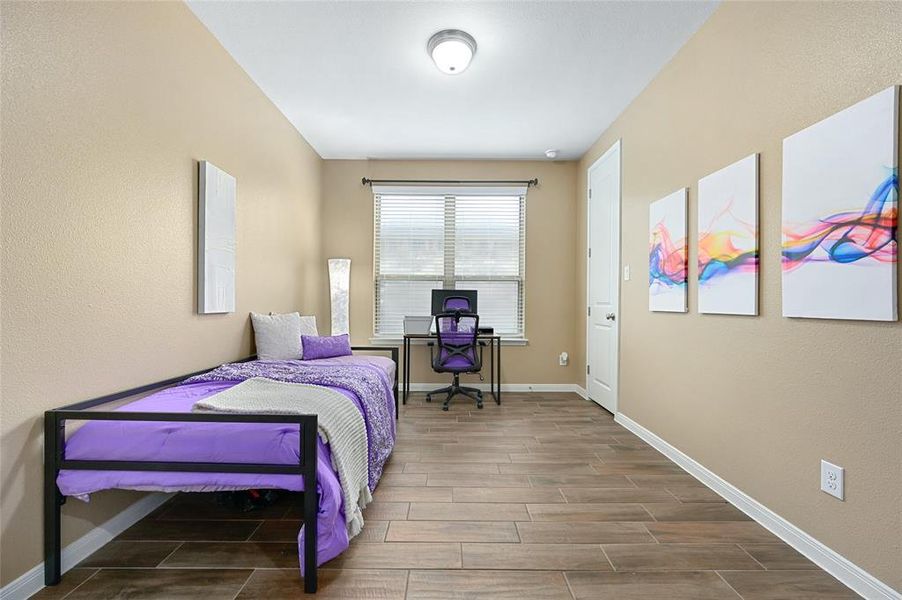 Secondary Bedroom Downstairs - Room features double doors and can be used as an office, or flex space.