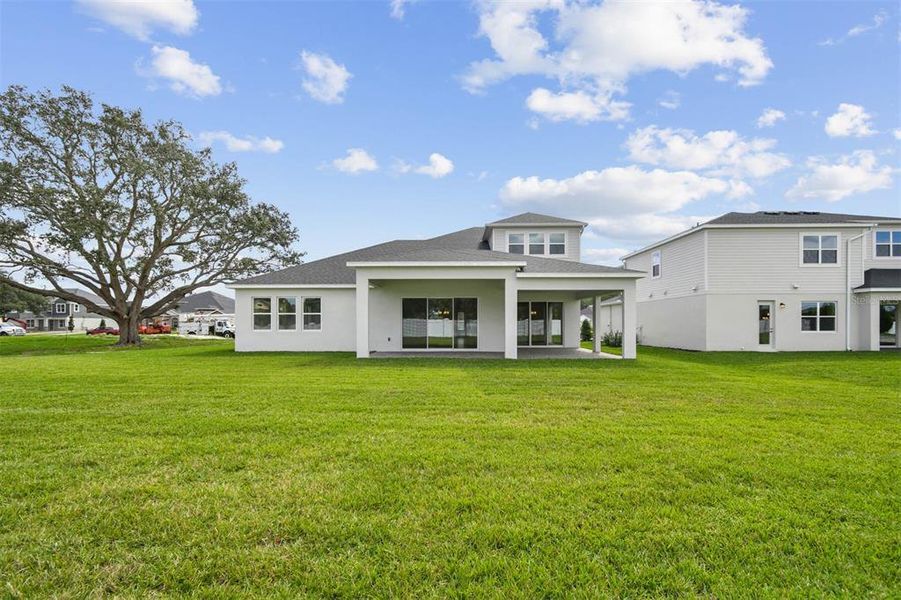 Exterior details and patio area of a home in Solace at Corner Lake, Orlando (Image 30).